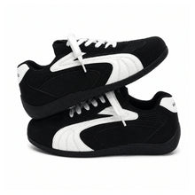 Retro Low-Top Trainers — Anti-Slip Wear-Resistant Sole on a pure white background