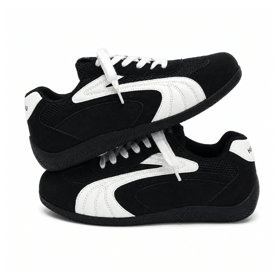 Retro Low-Top Trainers — Anti-Slip Wear-Resistant Sole on a pure white background
